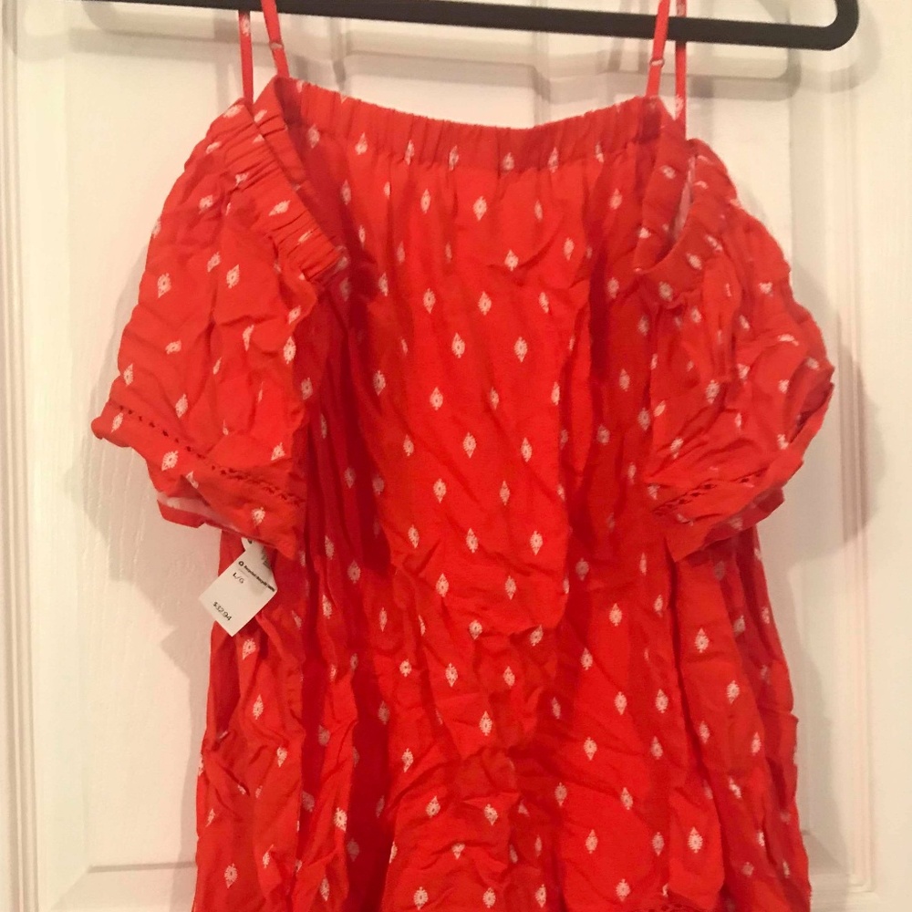 red off the shoulder shirt